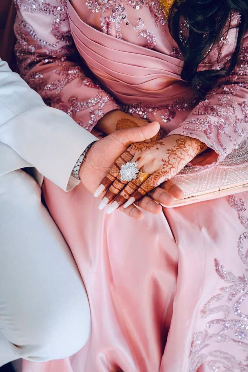 Blush nikah, hands together
