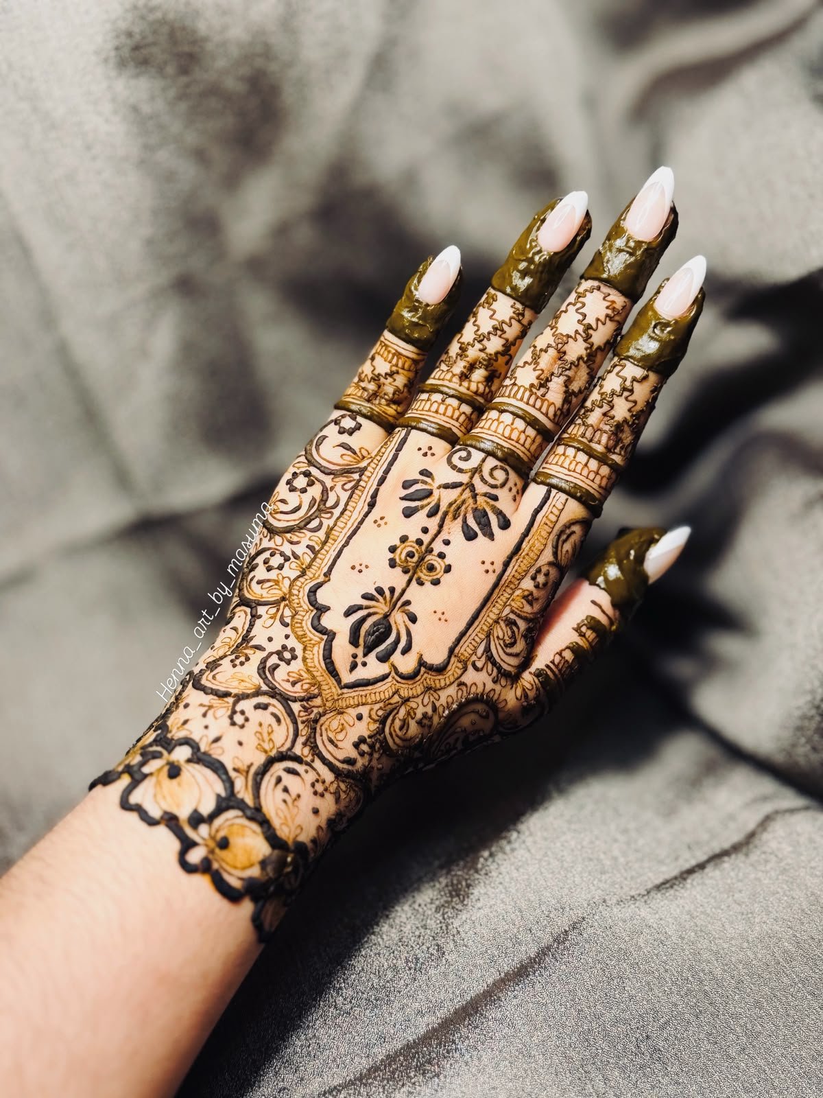 Fine henna linework drawn with a fresh cone